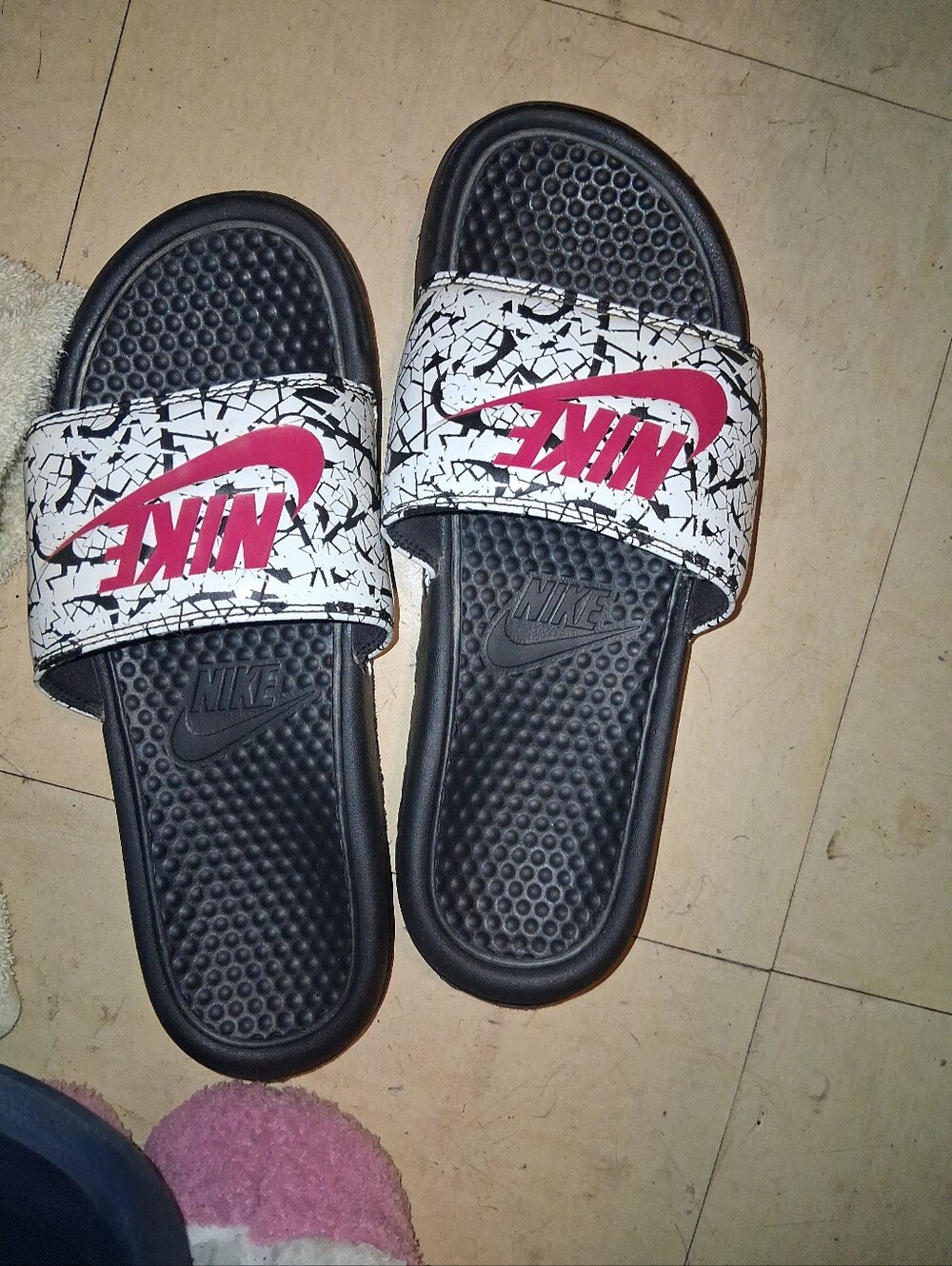 Nike Black Slides with White Speckled Strap and Pink Logo